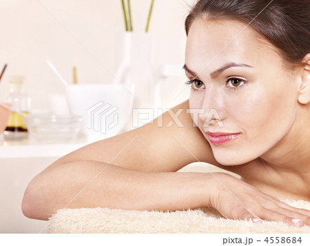 Young woman on massage table in beauty spa. 4558684