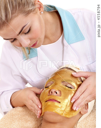 Girl with gold facial mask. Girl with gold facial mask. 4558794