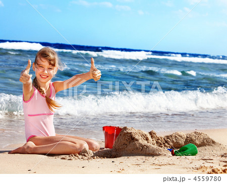Child playing on  beach. 4559780