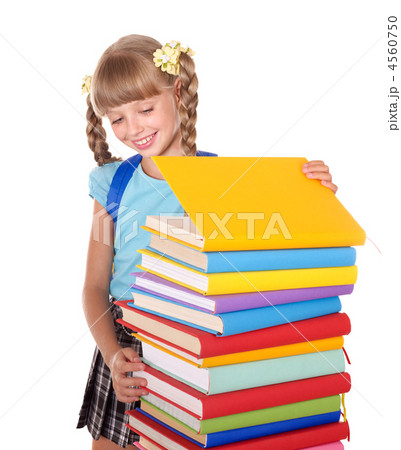 Schoolgirl with backpack holding pile of books. 4560750