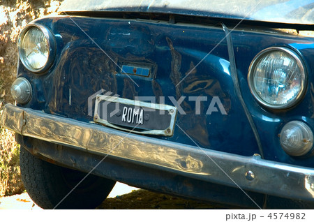 retro car in the old street of Rome 4574982