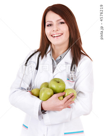 Doctor with stethoscope holding green apple.. Doctor with stethoscope holding green apple.. 4576219