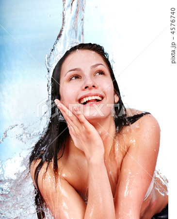 Beautiful girl in water. Body care. Beautiful girl in water. Body care. 4576740
