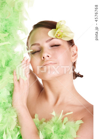Beautiful girl with orchid flower. 4576768