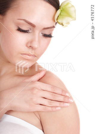 Beautiful girl with orchid flower. 4576772