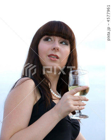 The girl with a glass of white wine 4577961