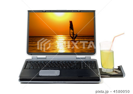 Laptop and cocktail. Isolated on white background 4580050