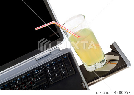 The laptop and cocktail. Isolated on white The laptop and cocktail. Isolated on white 4580053