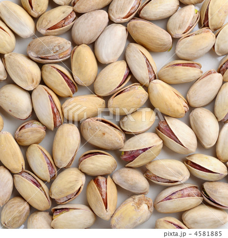 Toasted salted pistachios background Toasted salted pistachios background 4581885