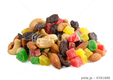 Pile of toasted nuts and candied fruits isolated on white background 4581886