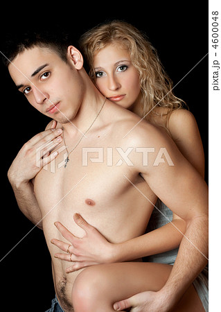 Attractive loving young couple. Isolated 4600048