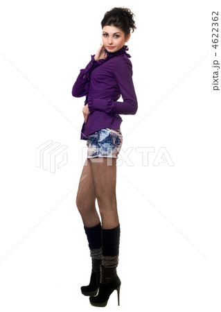 Pretty young woman in a denim skirt Pretty young woman in a denim skirt 4622362