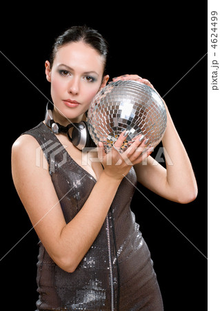 Portrait of beautiful young brunette with a mirror ball 4624499