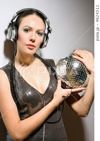 Portrait of brunette with a mirror ball 4624511