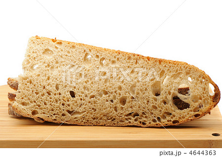 The cut bread on a chopping board The cut bread on a chopping board 4644363