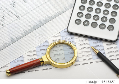 The calculator,loupe and the financial report 4646851