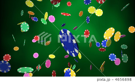 Casino chips dropping green background Casino chips dropping green background 4656898
