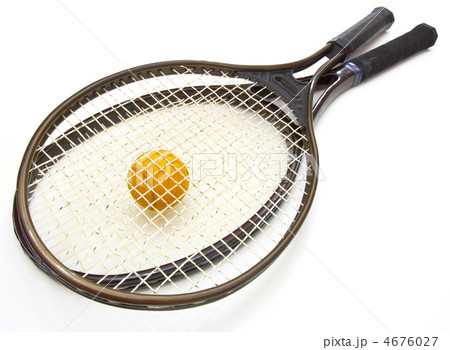 A tennis ball and racket on a white background A tennis ball and racket on a white background 4676027
