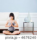 Asian woman practicing yoga at home. 4676240