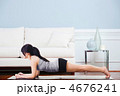 Asian woman practicing yoga at home. 4676241