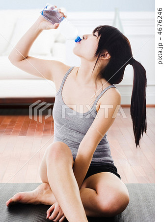 Asian woman drinking water. 4676246