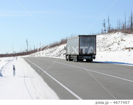 The truck on a winter road. The truck on a winter road. 4677407