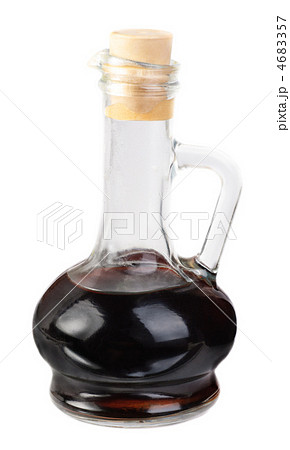Small decanter with balsamico vinegar  isolated on the  white background 4683357