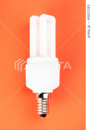 energy saving light bulb on red background 4683395
