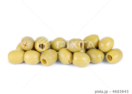 Some green pitted olives isolated on the white background Some green pitted olives isolated on the white background 4683643