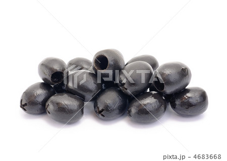 Some black pitted olives isolated on the white background Some black pitted olives isolated on the white background 4683668