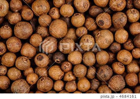 Background texture of whole allspice(jamaica pepper)  Used as a spice in cuisines all over the world. Also used in medicine. 4684161