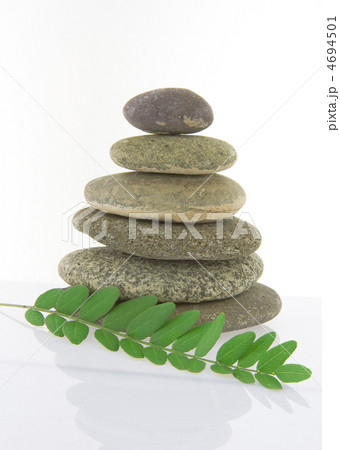 concept pebble stack with leaf 4694501