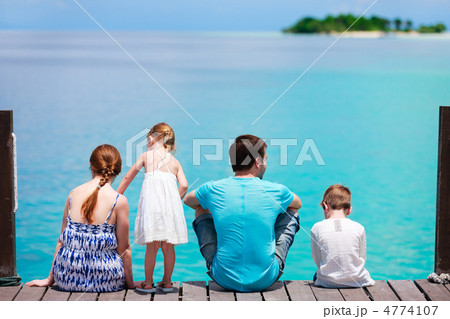 Family at tropical vacation 4774107