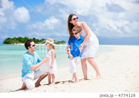 Happy family on tropical vacation 4774126