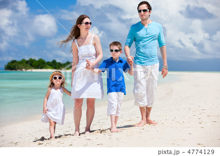 Happy family on tropical vacation 4774129