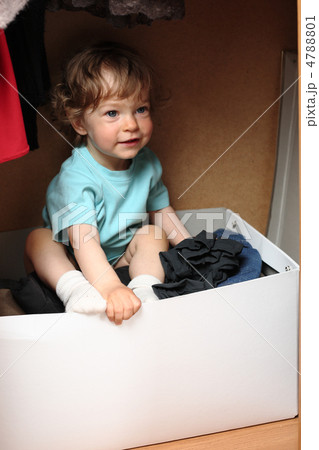 Child in wardrobe Child in wardrobe 4788801