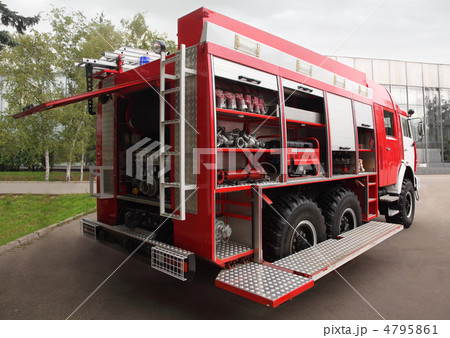 Side view of fire cocks and hoses equipped inside big red fire e 4795861