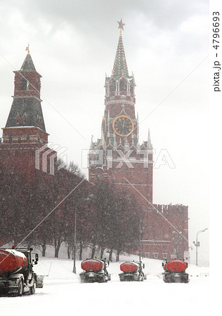 Column of snow-remover trucks on the road near Kremlin chiming c Column of snow-remover trucks on the road near Kremlin chiming c 4796693