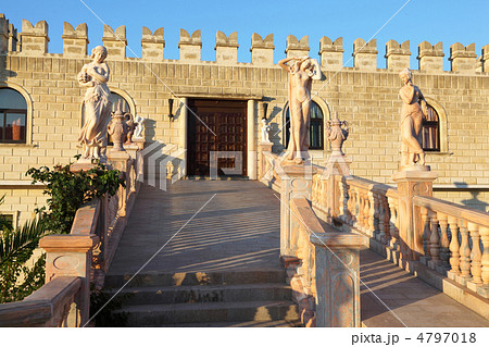Wide stair with ancient statues and sculptured rails, which cond Wide stair with ancient statues and sculptured rails, which cond 4797018