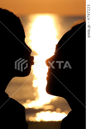 Girl stretches with  kiss to  woman opposite sunbeams 4797223