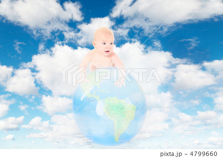 little baby on Earth globe on White, fluffy clouds in blue sky c little baby on Earth globe on White, fluffy clouds in blue sky c 4799660