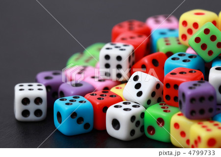 Bright playing bones lie on tabletop 4799733