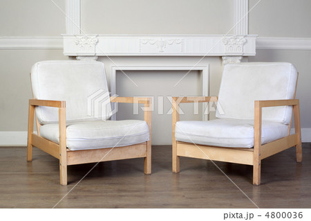 two white chairs and beautiful ornate decorative plaster molding 4800036