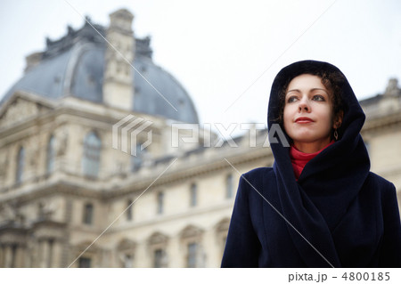 PARIS - DECEMBER 31: Young woman close-up stands in the courtyar 4800185