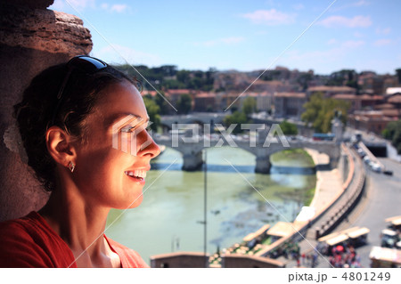 Young beautiful woman near window in Sant' Angelo Castel. View o 4801249