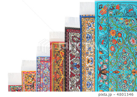 Seven varicoloured carpets lie stairs on growth on each other 4801346