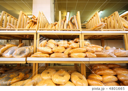 lots of fresh crisp loaves of bread on shelves in store; abundan lots of fresh crisp loaves of bread on shelves in store; abundan 4801665