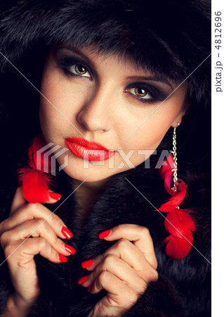 Beautiful young woman wearing fur hat Beautiful young woman wearing fur hat 4812696