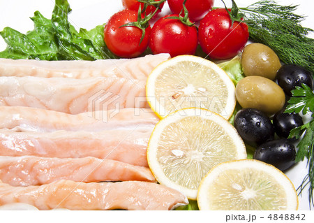 raw red fish with lemon and olive raw red fish with lemon and olive 4848842