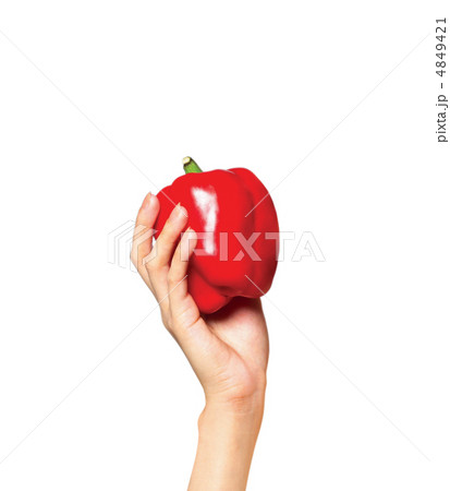 Large red bell pepper in a human hand 4849421